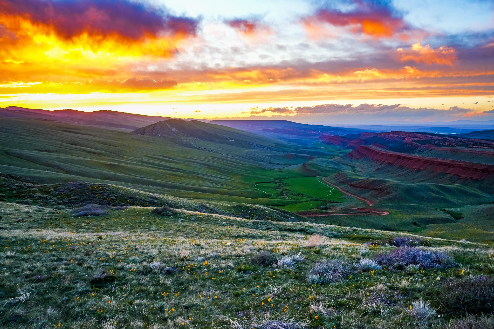 Sunset over Red Canyon, WY from Sand Draw Road near Beaver Rim, May 2025. Photo by Libby Ann.